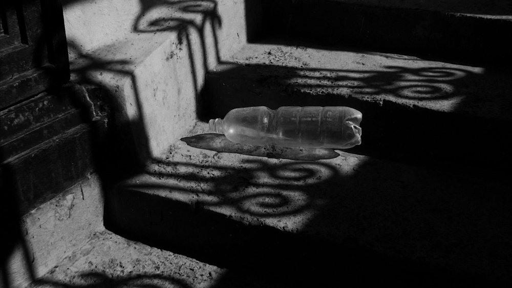 Plastic Bottle Stair Dance — still 2